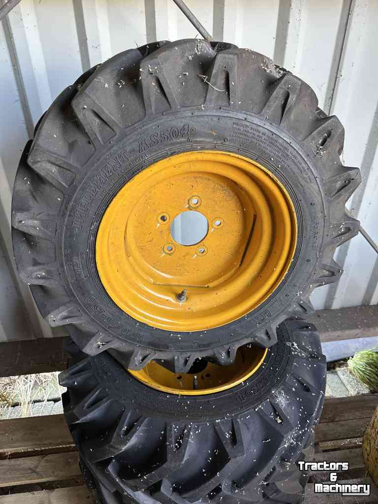 Räder, Reifen, Felgen & Distanzringe  10.0/75-15.3 BKT inplement -AS504