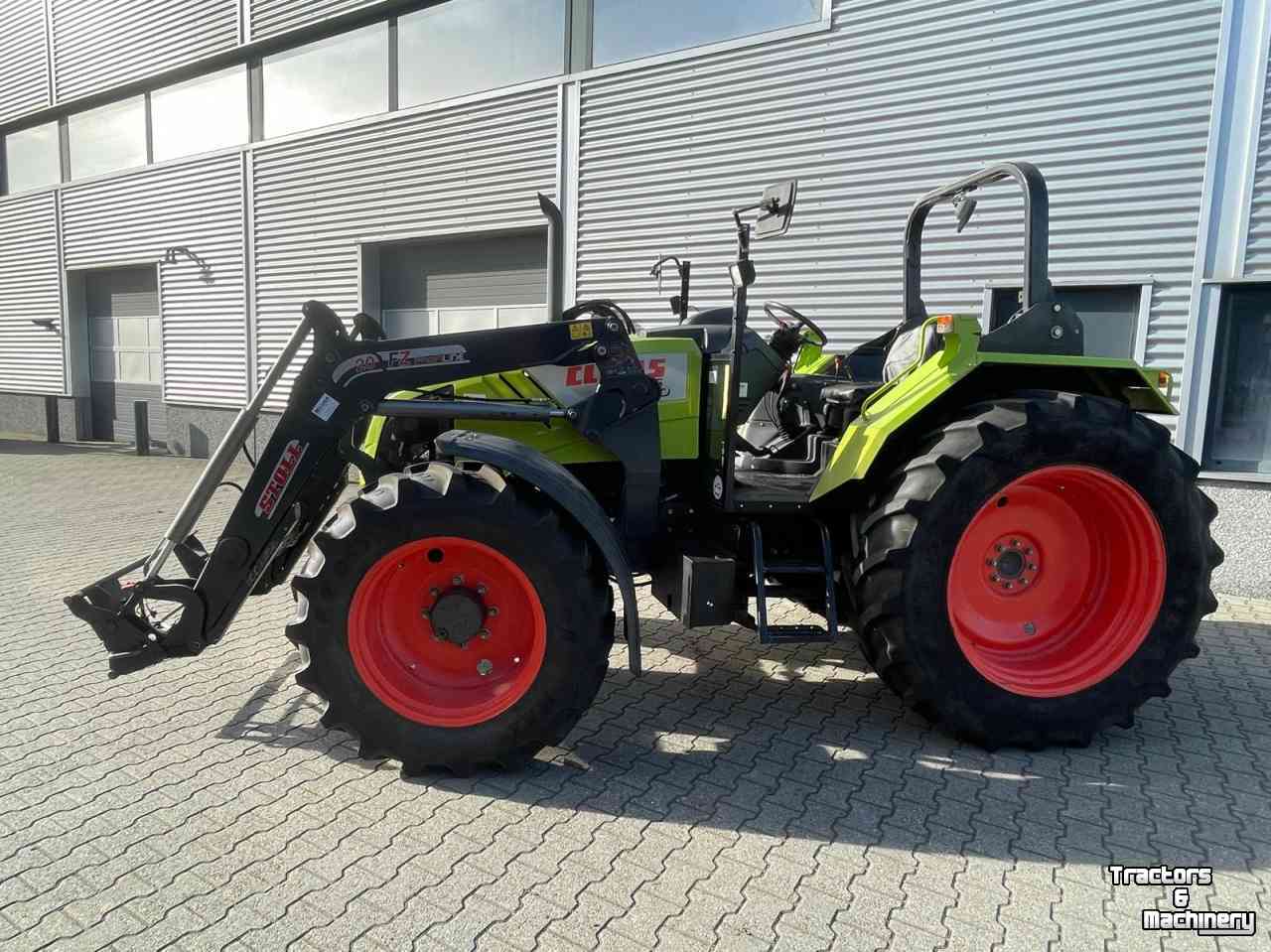 Schlepper / Traktor Claas Axos 340 tractor met Stoll voorlader
