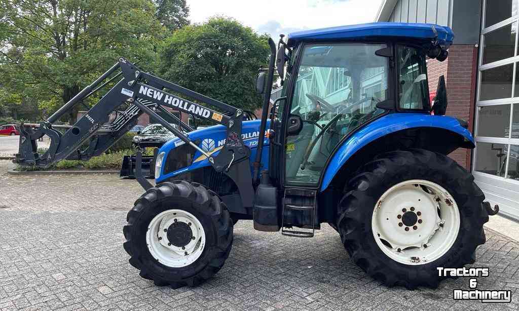 Schlepper / Traktoren New Holland TD5.65 met Stoll 510TL voorlader / frontlader
