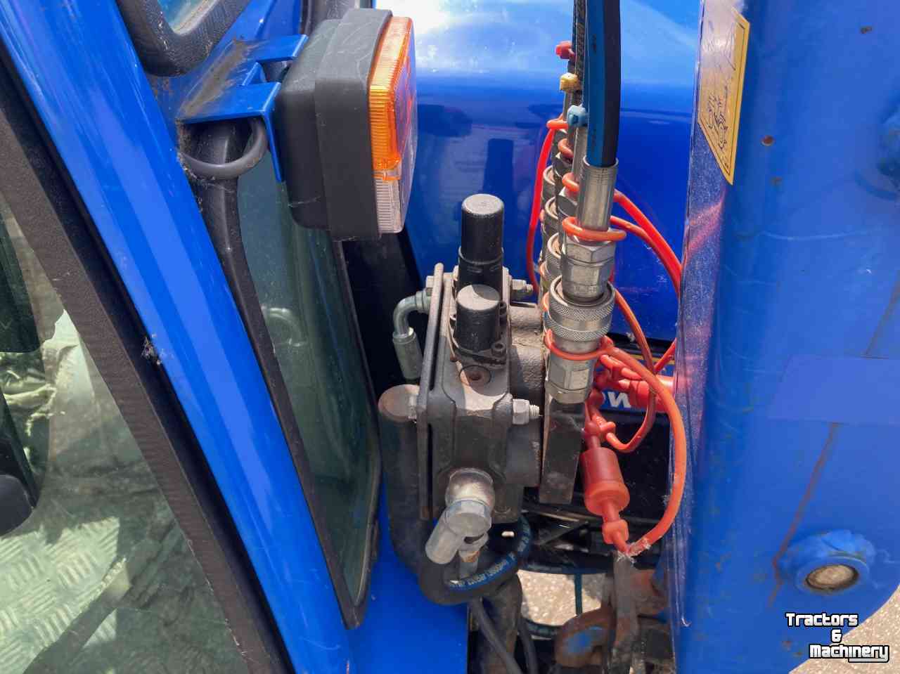 Gartentraktoren New Holland TC24D  compact tuinbouw traktor