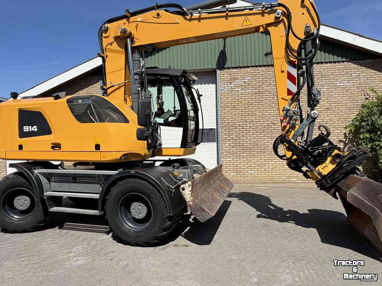 Mobilbagger Liebherr A914 met Draaikantelstuk