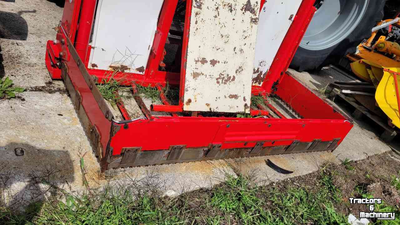 Siloblockschneider Trioliet TU 195  met hefmast en mechanische afschuiver