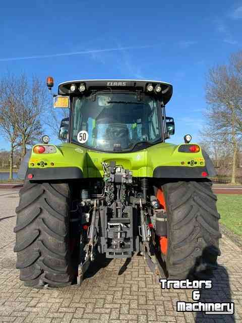 Schlepper / Traktoren Claas Arion 610 met voorlader