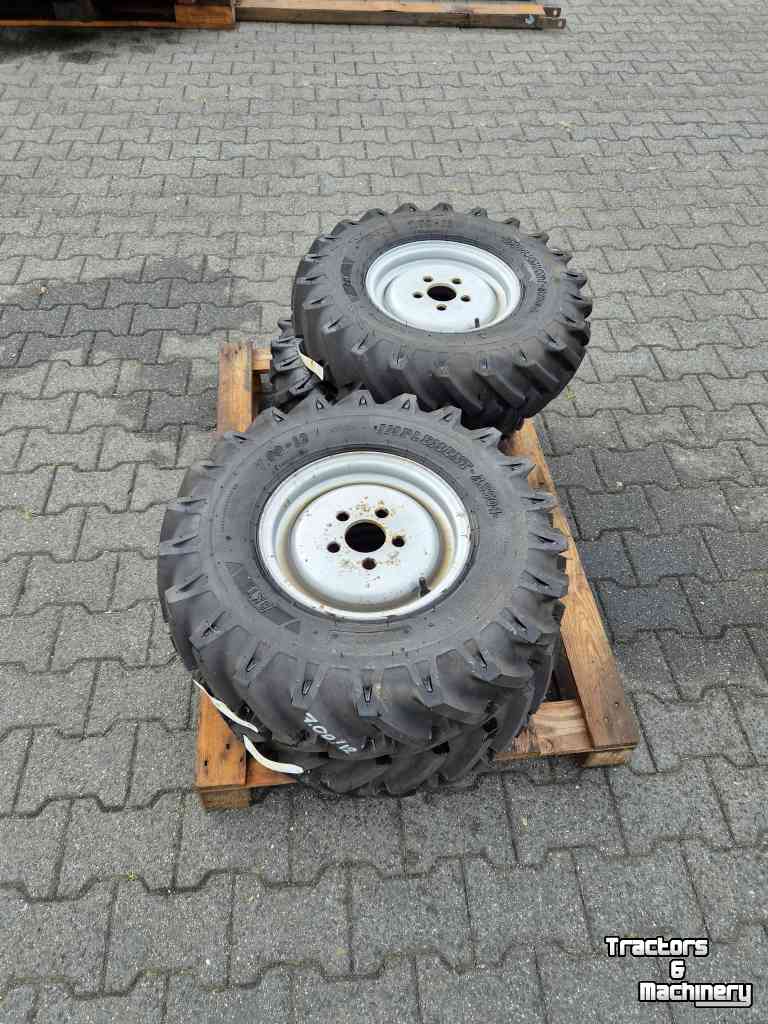 Räder, Reifen, Felgen & Distanzringe BKT 4x BKT 7.00-12 met velg