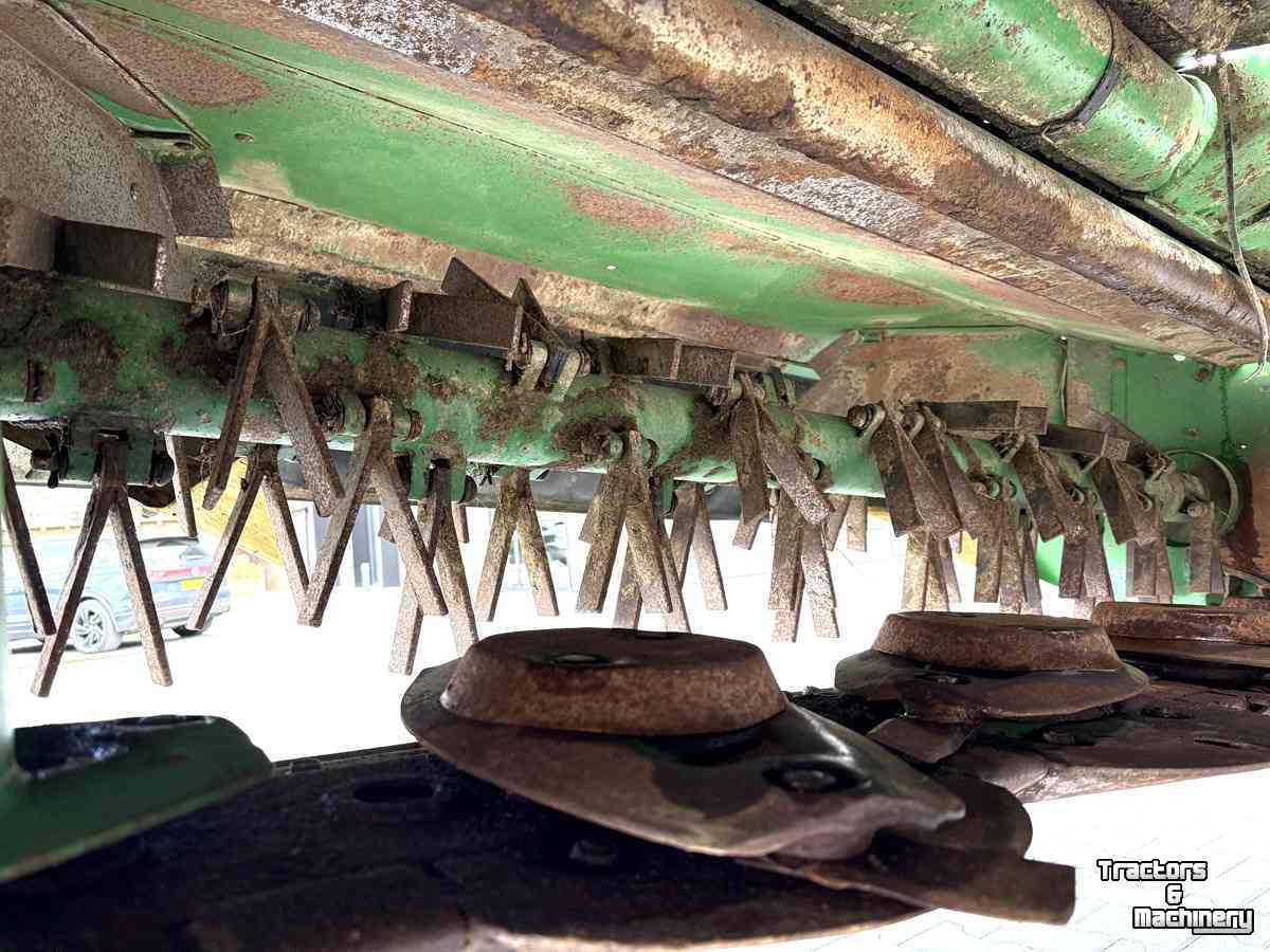 Mähwerk John Deere 328 DISC maaier