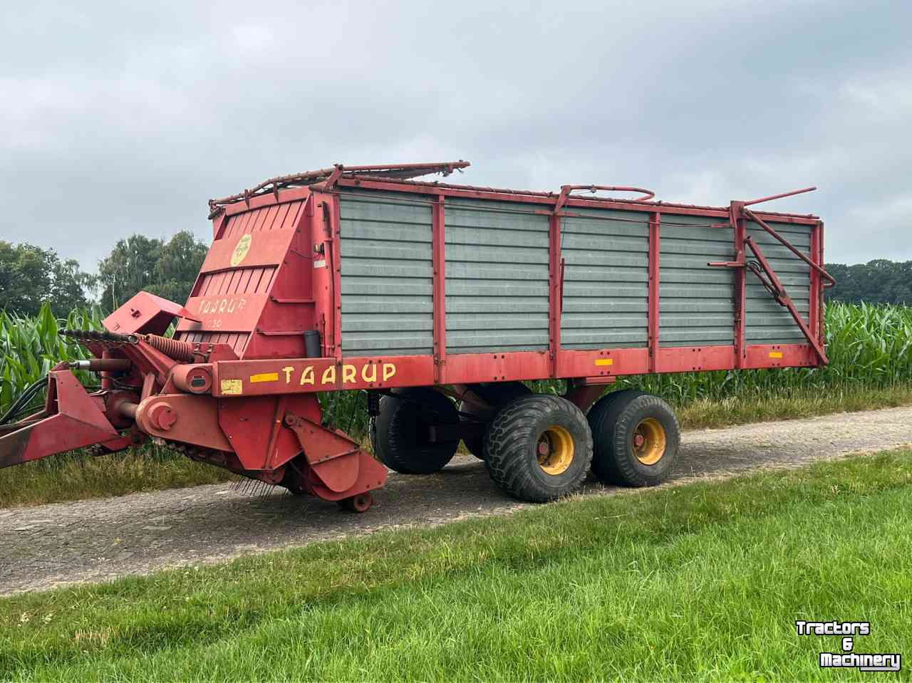 Lade- und Dosierwagen Taarup 1030 Opraapwagen / Ladewagen