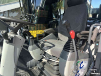 Mobilbagger Komatsu PW180-10 met LMB  Lastmomentbeveiliging