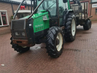 Rückewagen Valtra 6550 + MOHEDA UITRIJWAGEN