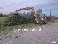 Radlader Liebherr 507 met slachmaaier