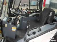Geräteträger Multihog CX 75 werktuigdrager met Mc Connel arm klepelbak