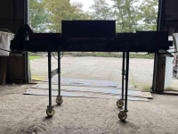 Kistenfüllgeräte Keulmac Kistenvulband met valbrekers