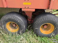 Lade- und Dosierwagen Taarup 465 Opraapwagen met goede type rotor