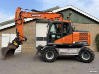 Bagger / Baggermaschine Doosan DX140w-5 met draaikantelstuk egcon