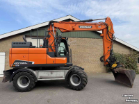 Bagger / Baggermaschine Doosan DX140w-5 met draaikantelstuk egcon