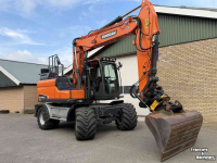 Bagger / Baggermaschine Doosan DX140w-5 met draaikantelstuk egcon