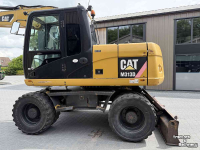 Bagger / Baggermaschine Caterpillar M313D