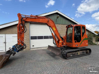 Bagger / Baggermaschine Case CX80 C met draai kantelstuk