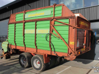 Lade- und Dosierwagen Strautmann Super Vitesse opraapwagen ladewagen rotor invoerwals 8-wielig tandem onderstel