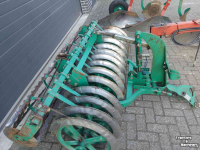 Pflüge Kverneland VD 85 4 schaar ploeg met Packomat vorenpakker