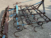 Grubber  Triltand cultivator met rol / verkruimelrol