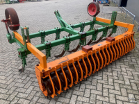 Grubber Cappon cultivator met pakkerrol