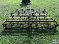 Grubber  Triltand cultivator met verkruimelrol rol