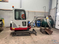 Raupenbagger Takeuchi TB016 met machinetrailer