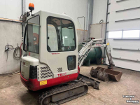 Raupenbagger Takeuchi TB016 met machinetrailer