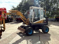 Minibagger Komatsu PW 30 Bandenkraan
