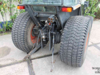 Gartentraktoren Kubota L3300 tuinbouwtrekker smalspoortrekker tractor met cabine en gazonbanden