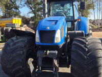 Schlepper / Traktor New Holland TVT 145 Met Fronthef, Motor defect