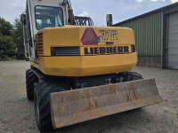 Mobilbagger Liebherr 312 banden kraan graafmachine