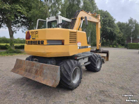 Mobilbagger Liebherr 312 banden kraan graafmachine