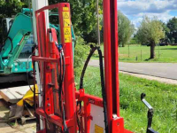 Siloblockschneider Trioliet TU 195  met hefmast en mechanische afschuiver