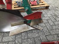 Pflüge Kverneland LB 5-schaar Wentelploeg met VSS pakker / packer