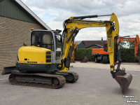 Minibagger Neuson 6003 met maaikorf functie