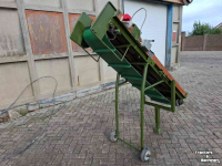 Förderband  Kistenvulband