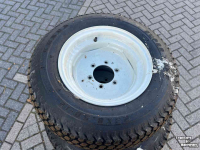 Räder, Reifen, Felgen & Distanzringe New Holland 33x12.50-16.5 +23x8.50-12 Boomer 25 gazon banden