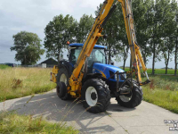 Schlepper / Traktor New Holland tsa 125 + Herder MBK 512LS