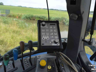Schlepper / Traktor New Holland tsa 125 + Herder MBK 512LS