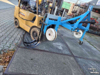 Ballenstechmaschine Robot zij schudlichter  / zij rooier