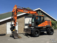 Mobilbagger Doosan DX140w-5 met draaikantelstuk