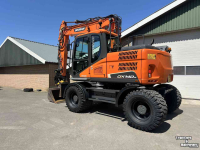 Mobilbagger Doosan DX140w-5 met draaikantelstuk