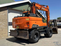Mobilbagger Doosan DX140w-5 met draaikantelstuk