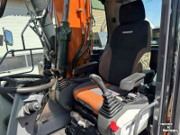 Mobilbagger Doosan DX140w-5 met draaikantelstuk